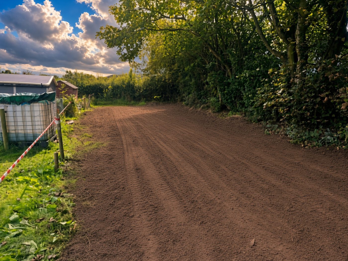 The finished path at Wingerworth allotments — unmade ground excavated and graded ready for use