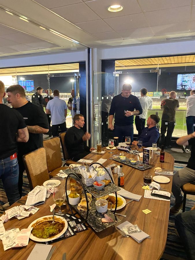Andy's Man Club leaflets on the tables through the evening