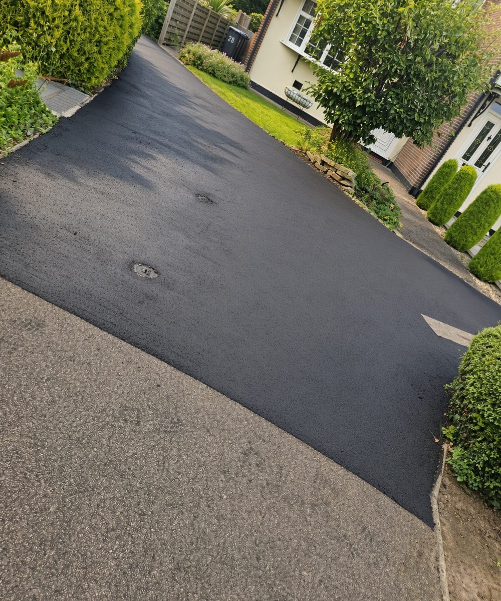 Slurry seal finish applied to a driveway